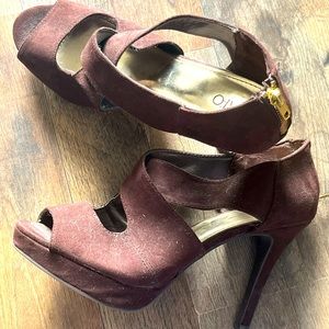 Brown 3 1/2 inch heels. Worn one time. Size 9.